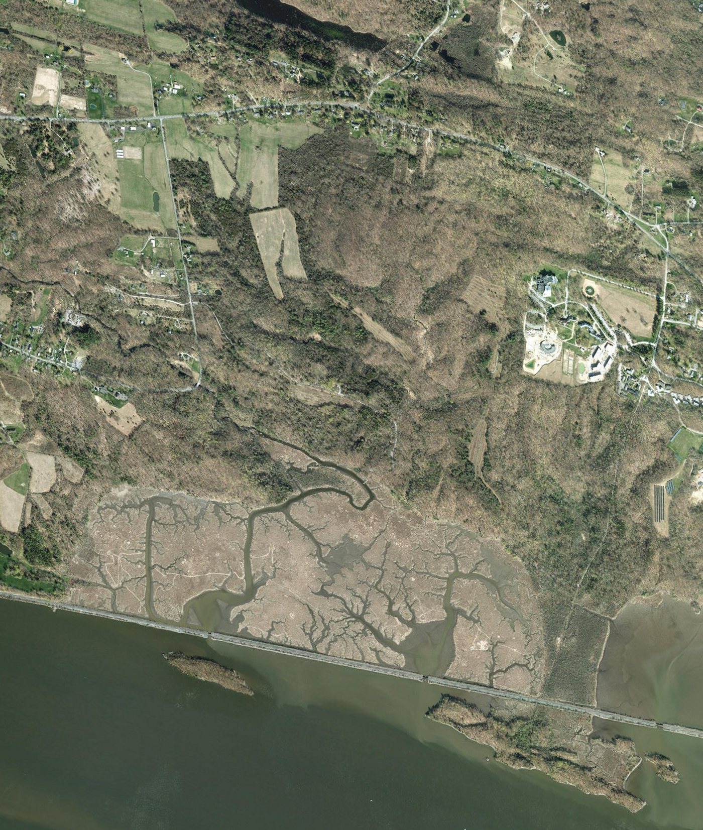 Modern satellite view of the Tivoli Bays area: intact marsh, forest, and the Hudson River shoreline