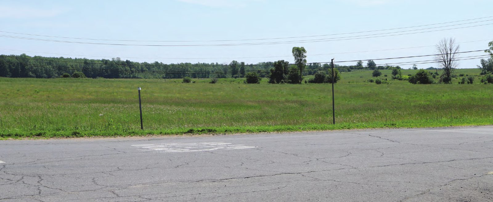A hayfield along US 11 in Canton, looking across the Rich Road site today